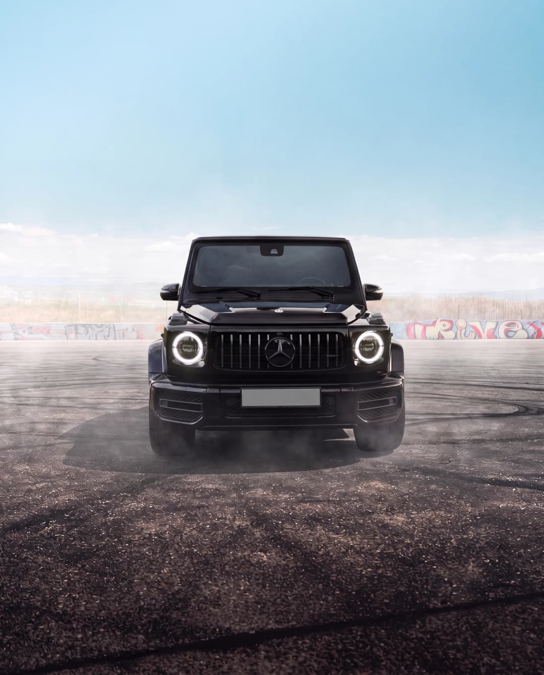 Black G63 2025 front view with round LED headlights